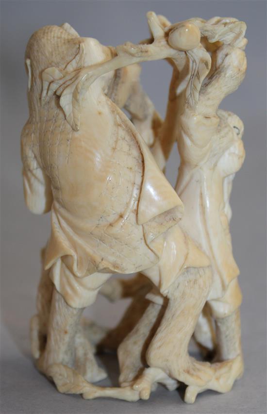 A Japanese carved ivory group of monkeys, Meiji period, 9.5cm